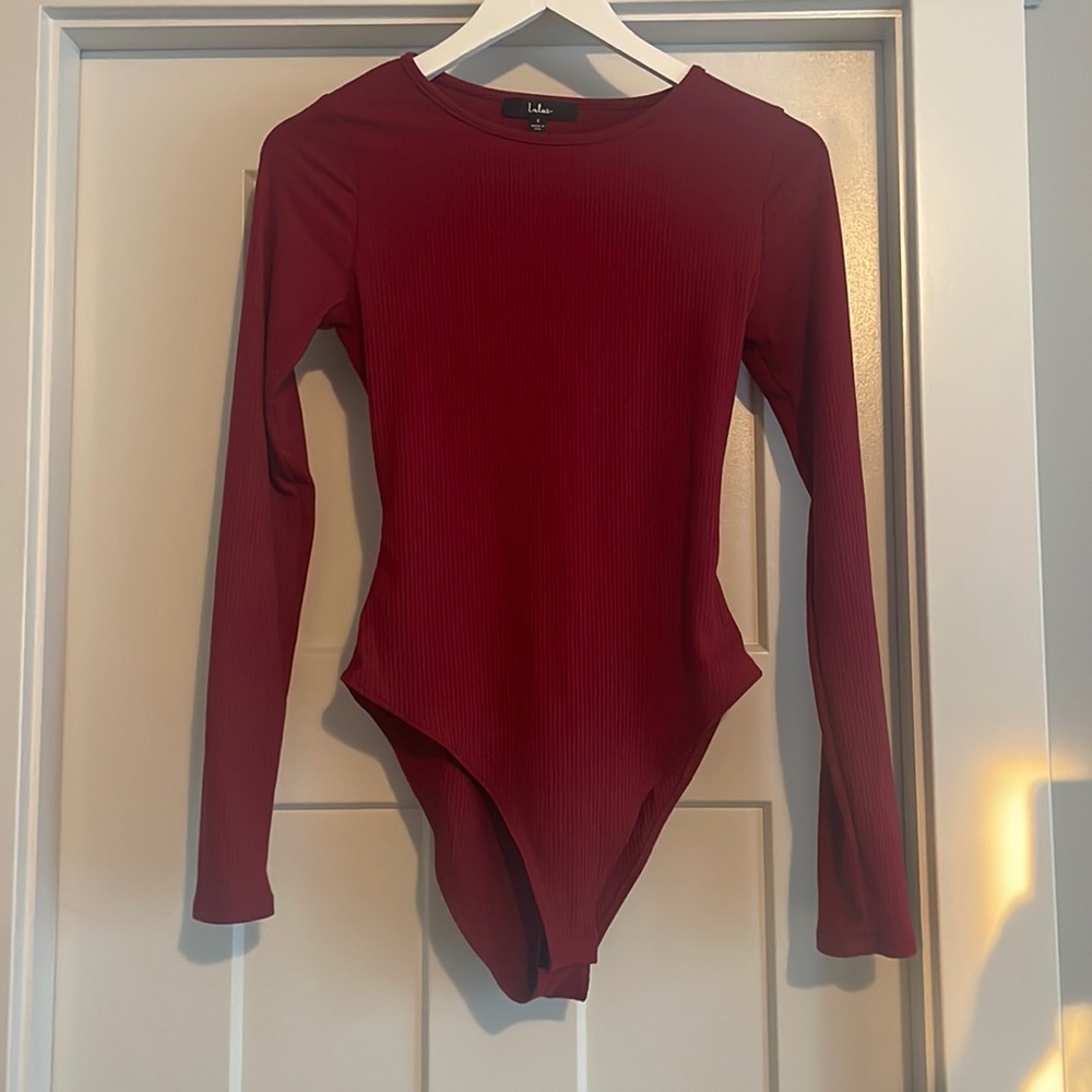 Maroon bodysuit.    Size S.  Open back.